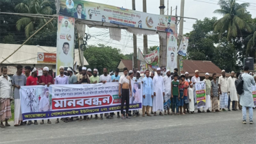 রূপগঞ্জে ঝুকিপূর্ণ বিদ্যুৎ লাইন অপসারণের দাবিতে মানববন্ধন