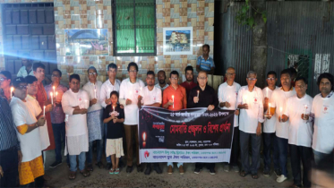 গণহত্যা দিবসে ঐক্য পরিষদের আলোক প্রজ্জ্বলন ও বিশেষ প্রার্থনা